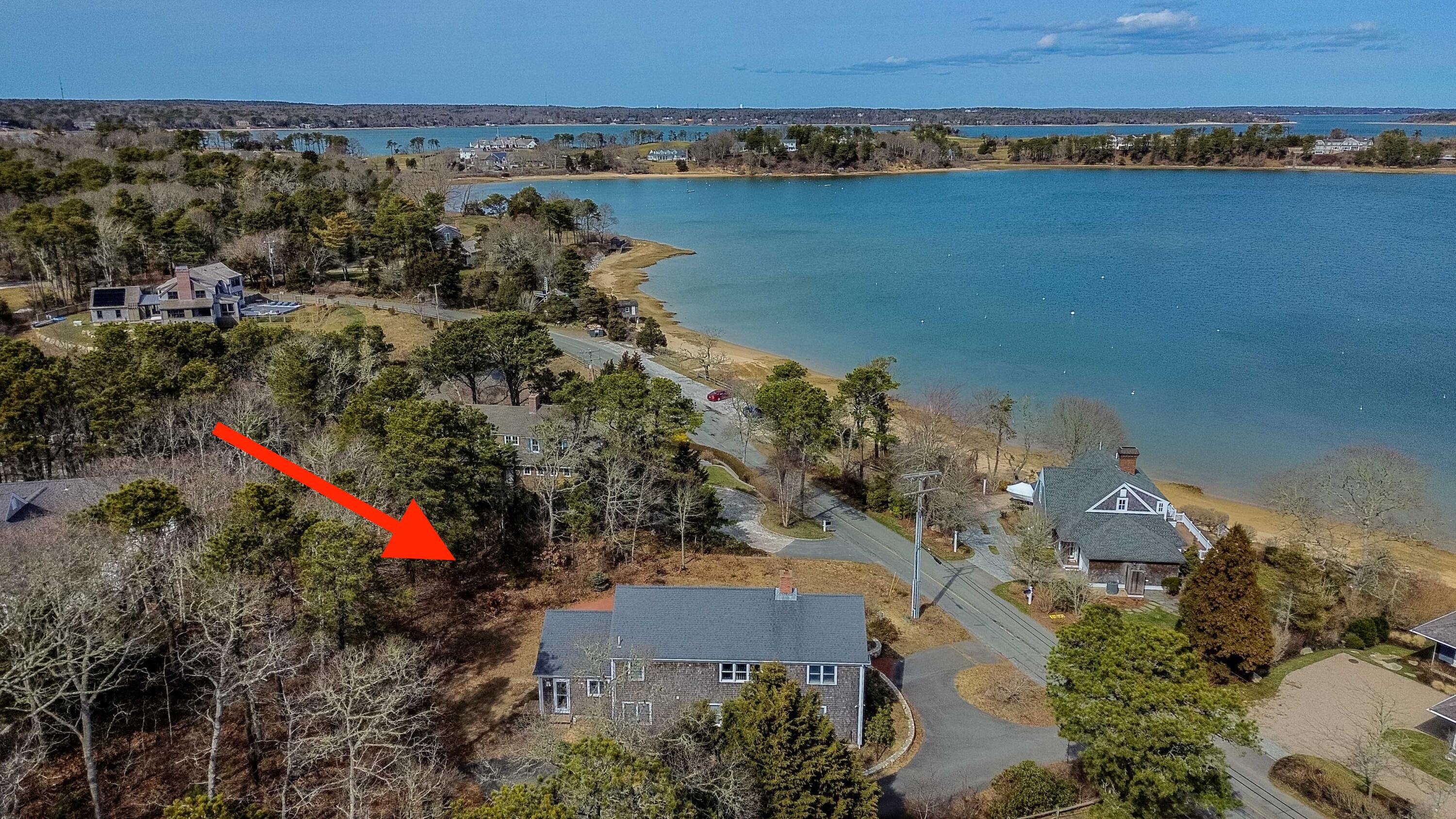 104 Seapine Road North Chatham, MA 02650 - Photo 3 of 36 an aerial view of a house with a yard and lake view