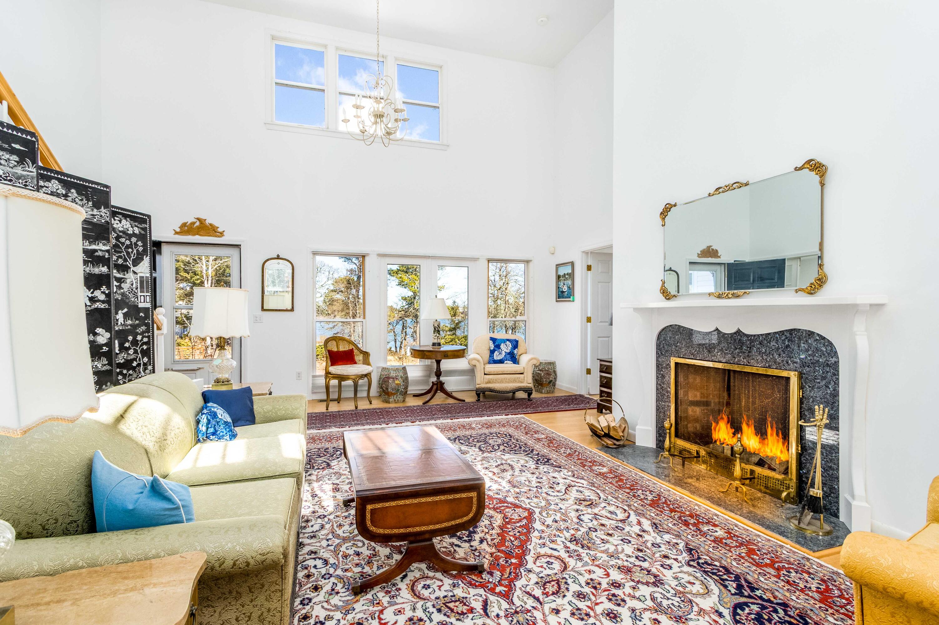 104 Seapine Road North Chatham, MA 02650 - Photo 9 of 36 a living room with furniture and a fireplace