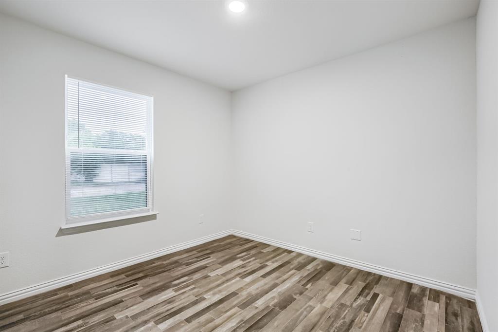 903 Olive Street Waco, TX 76704 - Photo 12 of 15 a view of a room that has a window in it