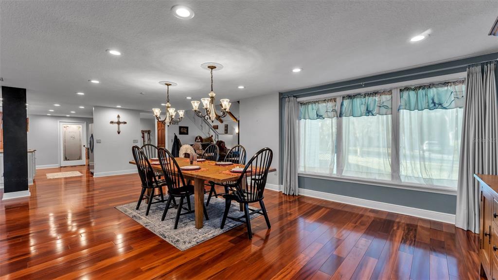 1804 Michelle Lane Lakeland, FL 33813 - Photo 18 of 83 a view of a dining room with furniture window and wooden floor