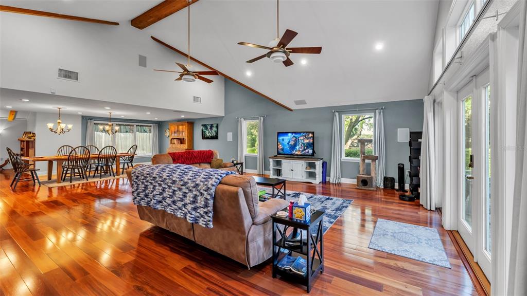 1804 Michelle Lane Lakeland, FL 33813 - Photo 23 of 83 a living room with furniture kitchen view and a wooden floor