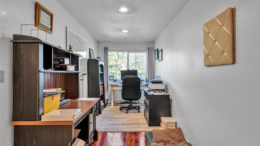 1804 Michelle Lane Lakeland, FL 33813 - Photo 54 of 83 a view of a workspace with furniture and a window
