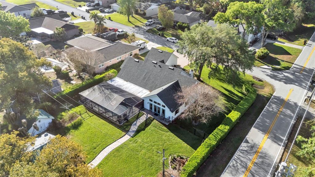 1804 Michelle Lane Lakeland, FL 33813 - Photo 6 of 83 an aerial view of a house with a garden and swimming pool