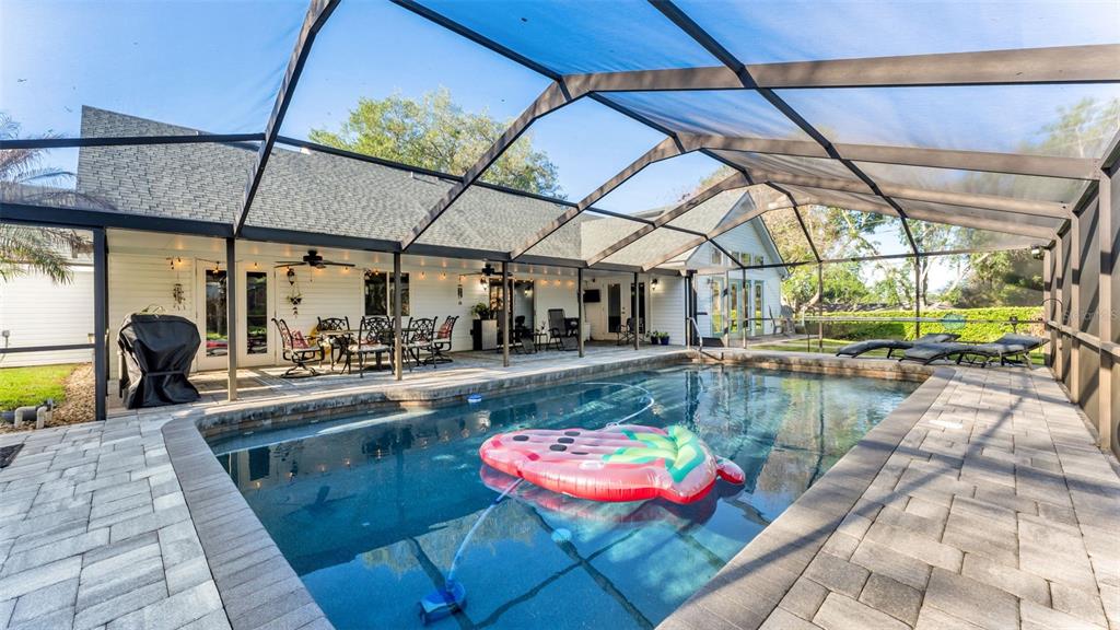 1804 Michelle Lane Lakeland, FL 33813 - Photo 62 of 83 a view of a swimming pool with a patio