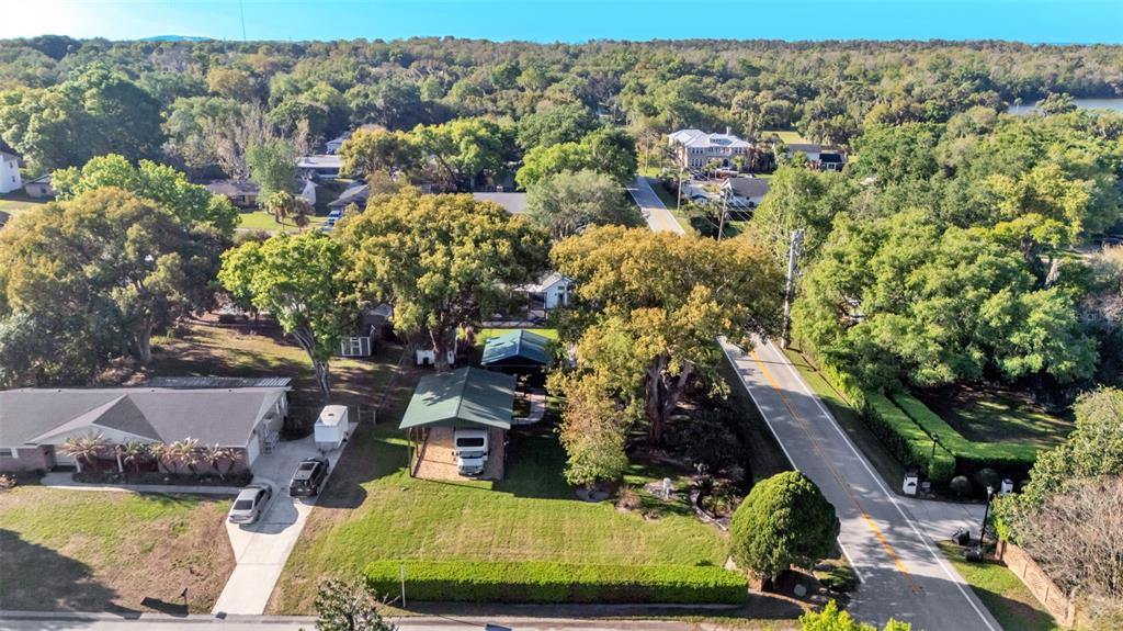 1804 Michelle Lane Lakeland, FL 33813 - Photo 7 of 83 an aerial view of a house with yard swimming pool and outdoor seating