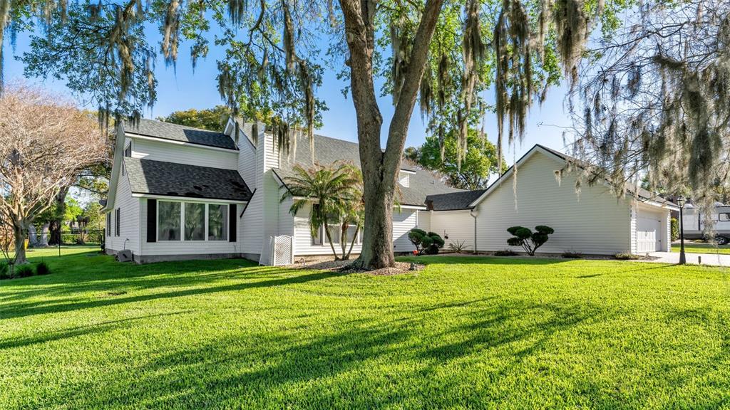 1804 Michelle Lane Lakeland, FL 33813 - Photo 78 of 83 a view of a house with a yard