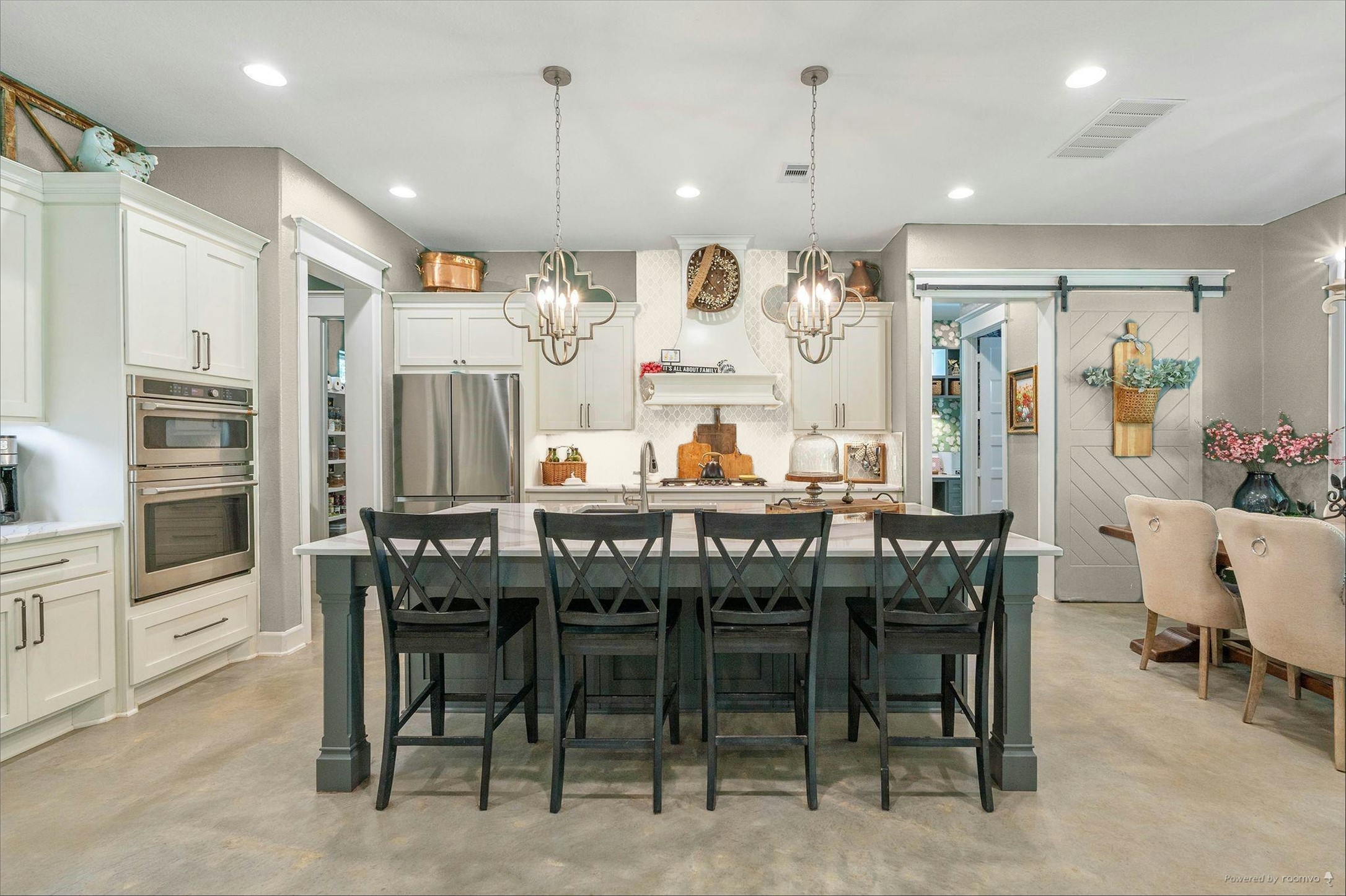 126 Fluorite Court Huntsville, TX 77340 - Photo 11 of 50 a view of a dining area with furniture window and wooden floor