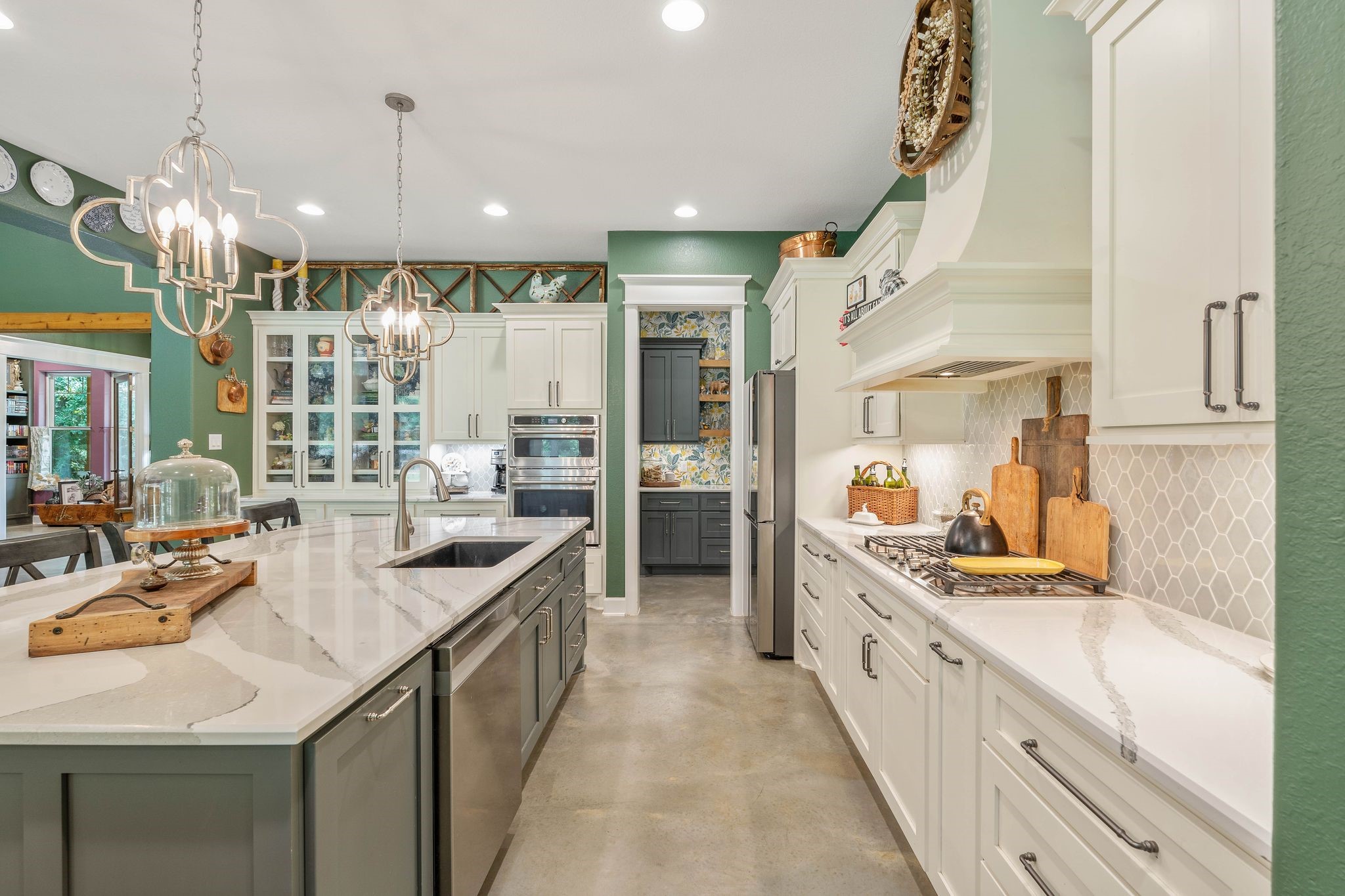 126 Fluorite Court Huntsville, TX 77340 - Photo 14 of 50 a large white kitchen with a large counter top appliances and cabinets
