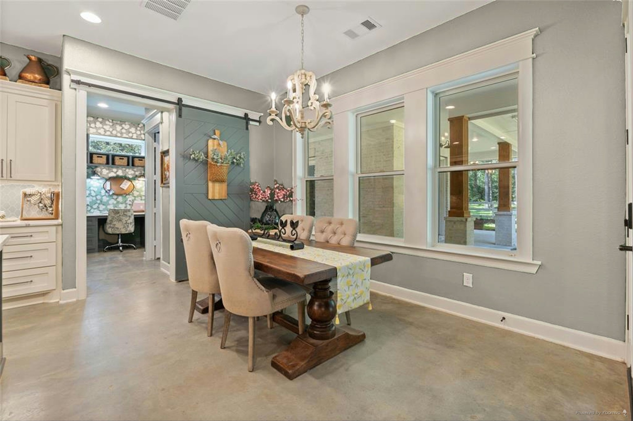126 Fluorite Court Huntsville, TX 77340 - Photo 15 of 50 a view of a livingroom with furniture and a chandelier