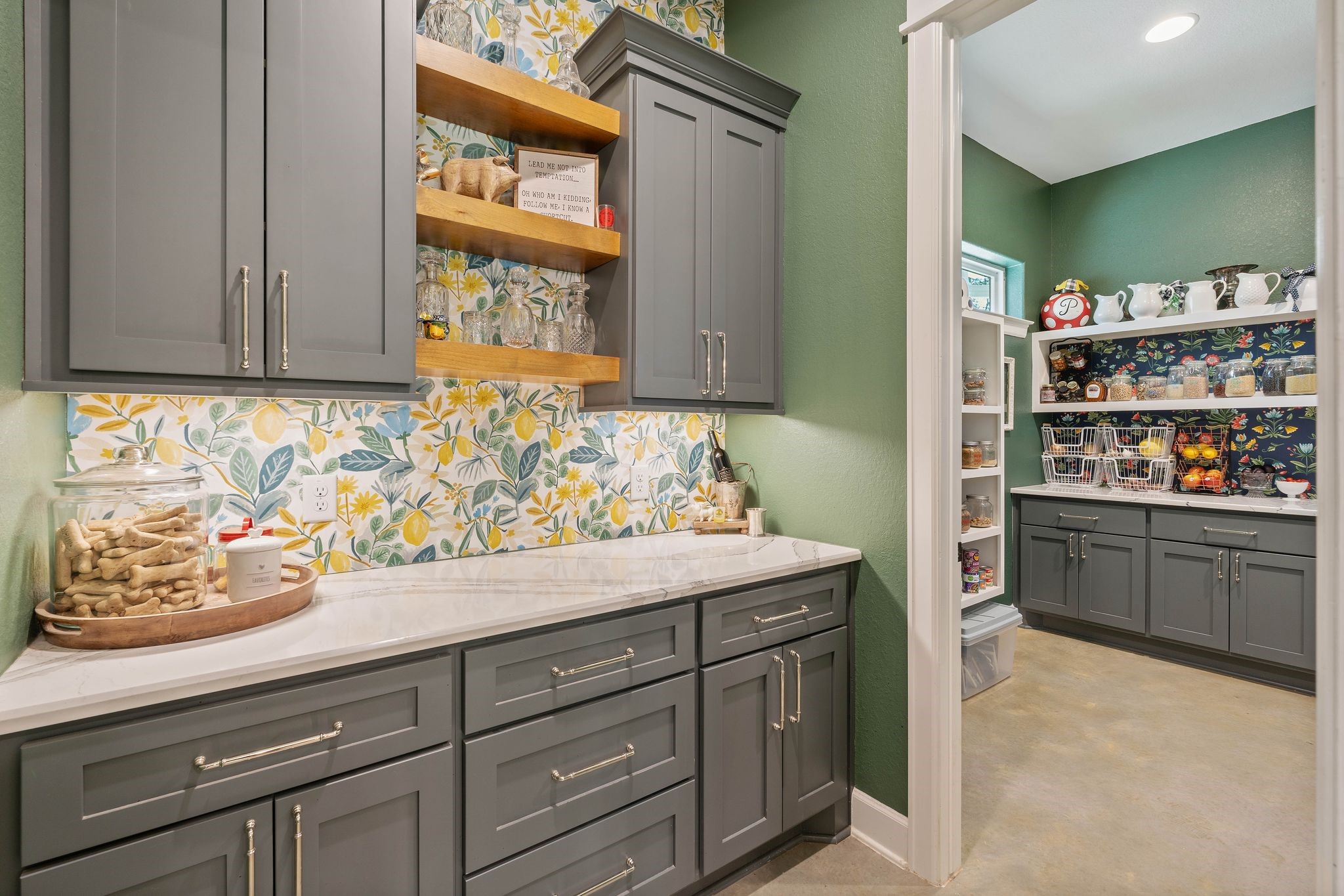 126 Fluorite Court Huntsville, TX 77340 - Photo 16 of 50 a kitchen with stainless steel appliances granite countertop a sink and cabinets