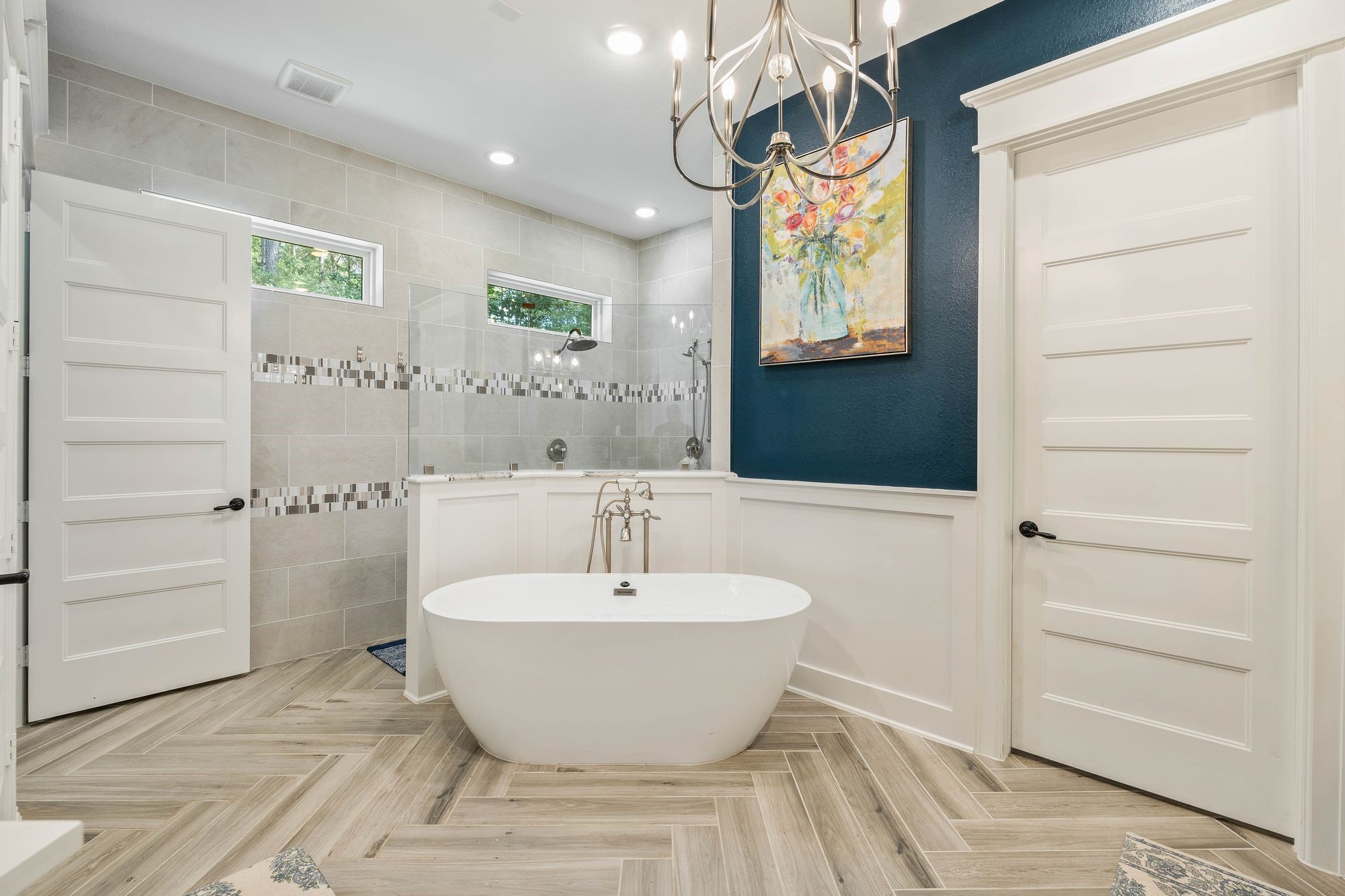 126 Fluorite Court Huntsville, TX 77340 - Photo 21 of 50 a spacious bathroom with a bathtub and a shower