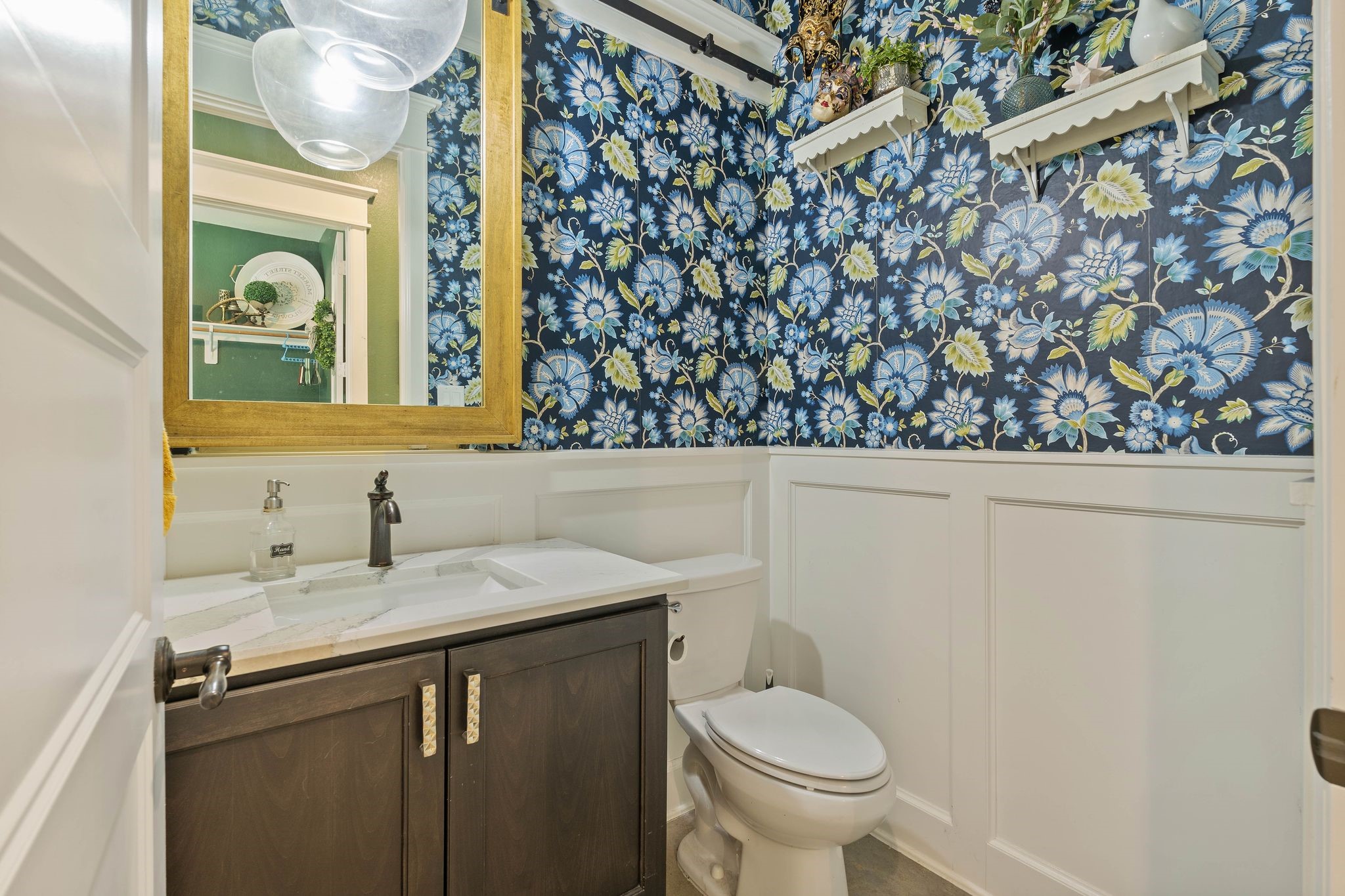 126 Fluorite Court Huntsville, TX 77340 - Photo 27 of 50 a bathroom with a sink a toilet and a mirror