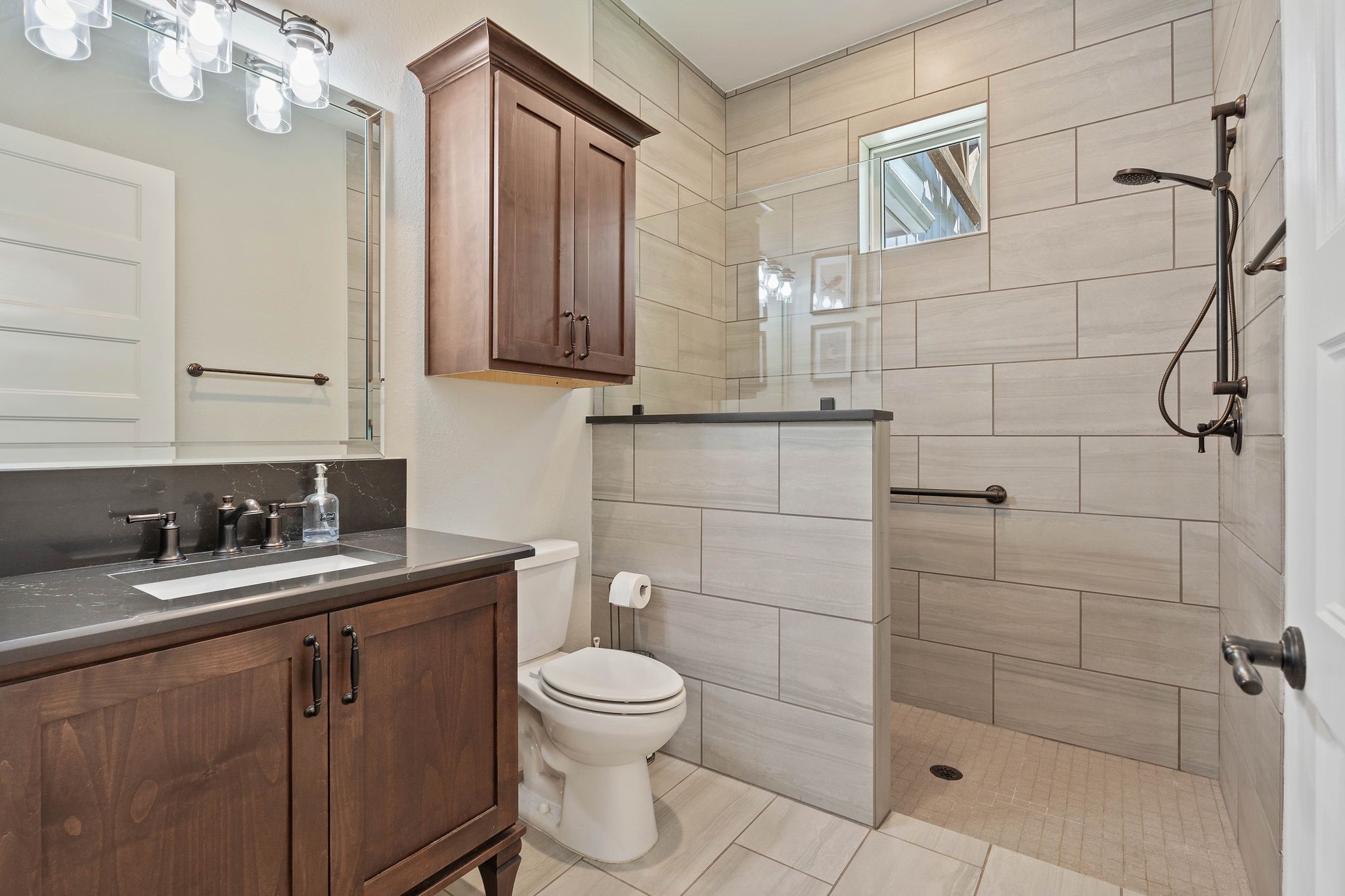 126 Fluorite Court Huntsville, TX 77340 - Photo 38 of 50 a bathroom with a toilet sink and shower
