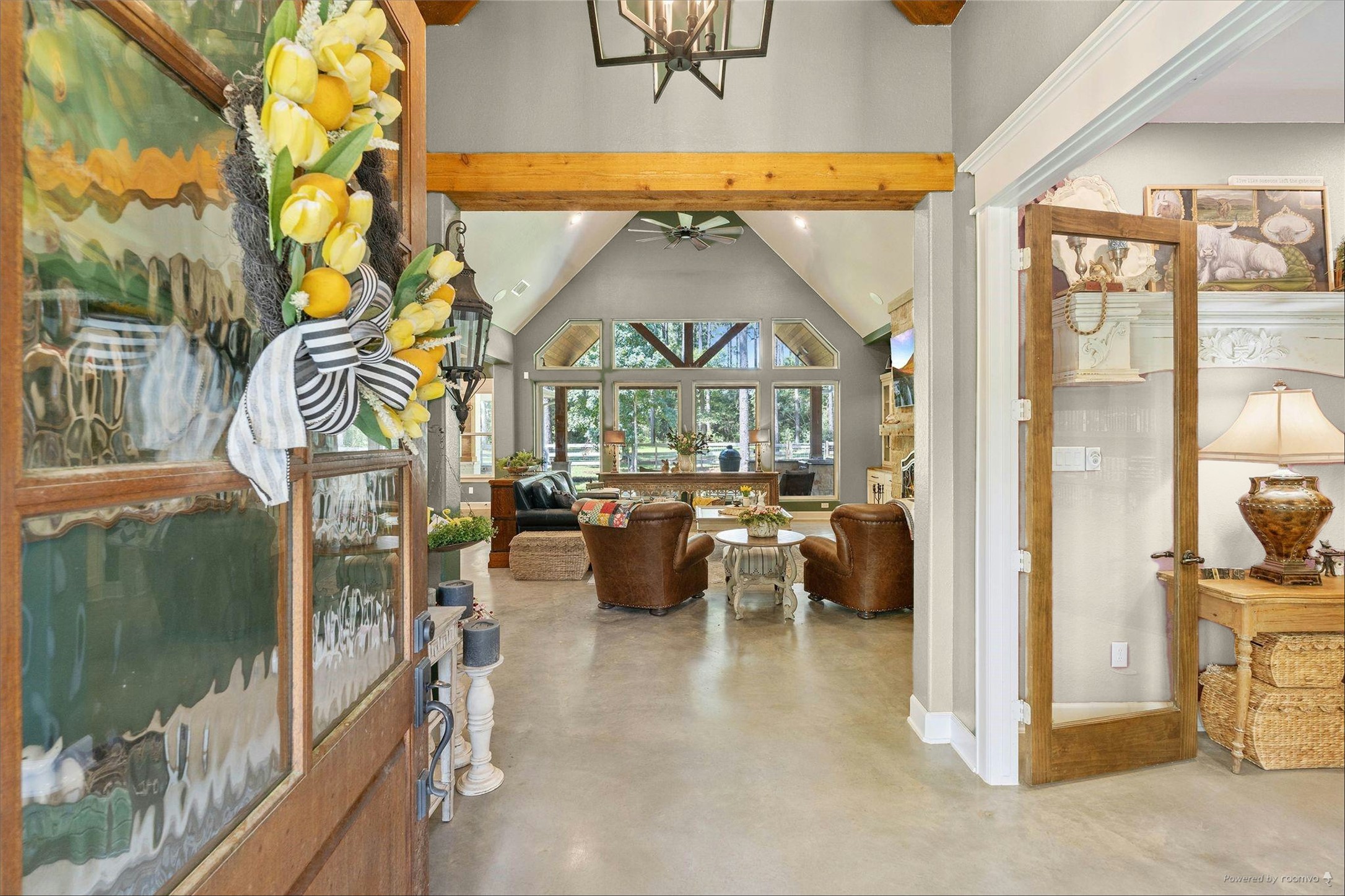 126 Fluorite Court Huntsville, TX 77340 - Photo 4 of 50 a view of living room kitchen and entryway