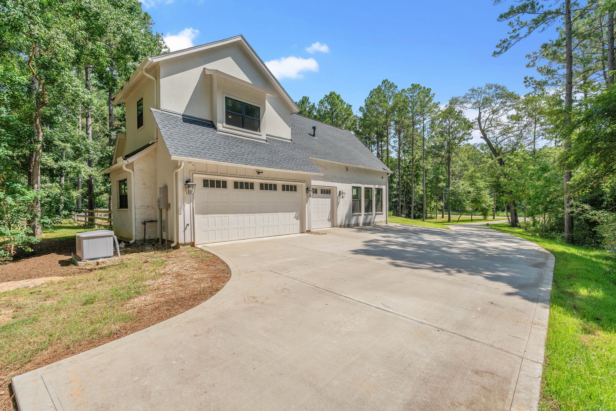 126 Fluorite Court Huntsville, TX 77340 - Photo 45 of 50 a house with trees in the background