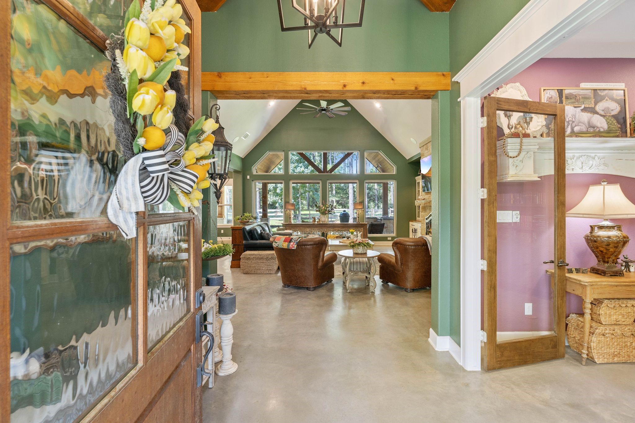126 Fluorite Court Huntsville, TX 77340 - Photo 5 of 50 a view of living room filled with furniture and chandelier