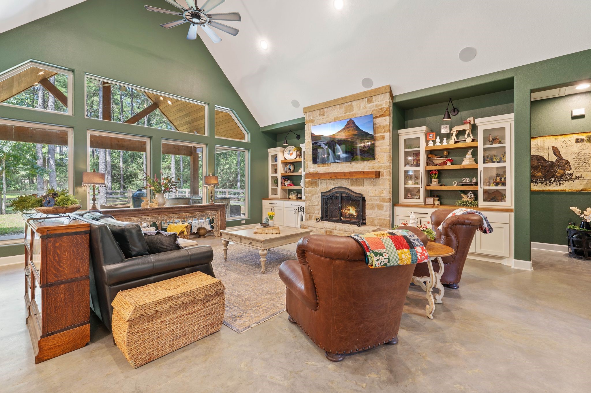 126 Fluorite Court Huntsville, TX 77340 - Photo 8 of 50 a living room with fireplace furniture and a large window