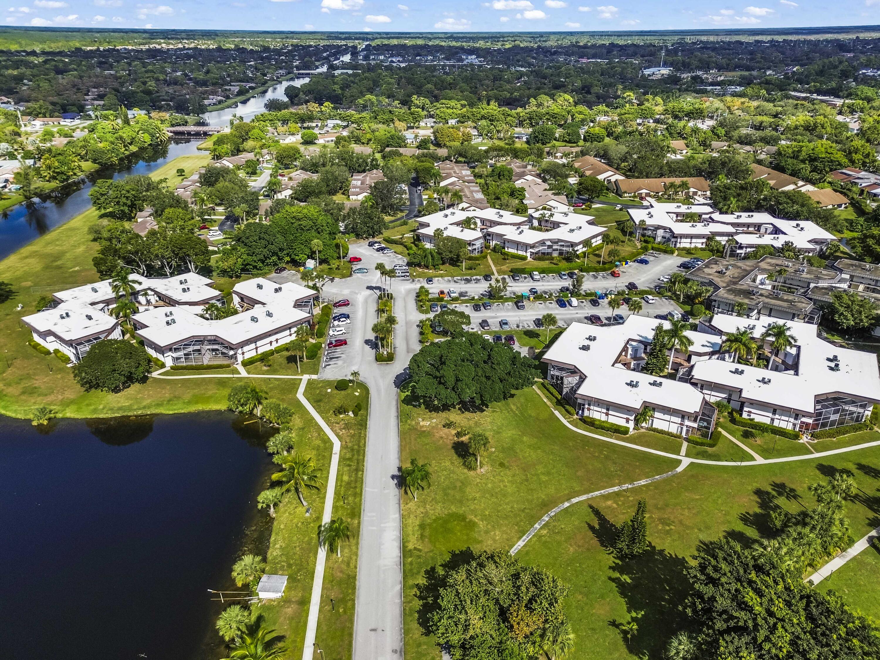 6 Greenway N Royal Palm Beach North, Unit 212 Royal Palm Beach, FL 33411 - Photo 22 of 23 a view of swimming pool