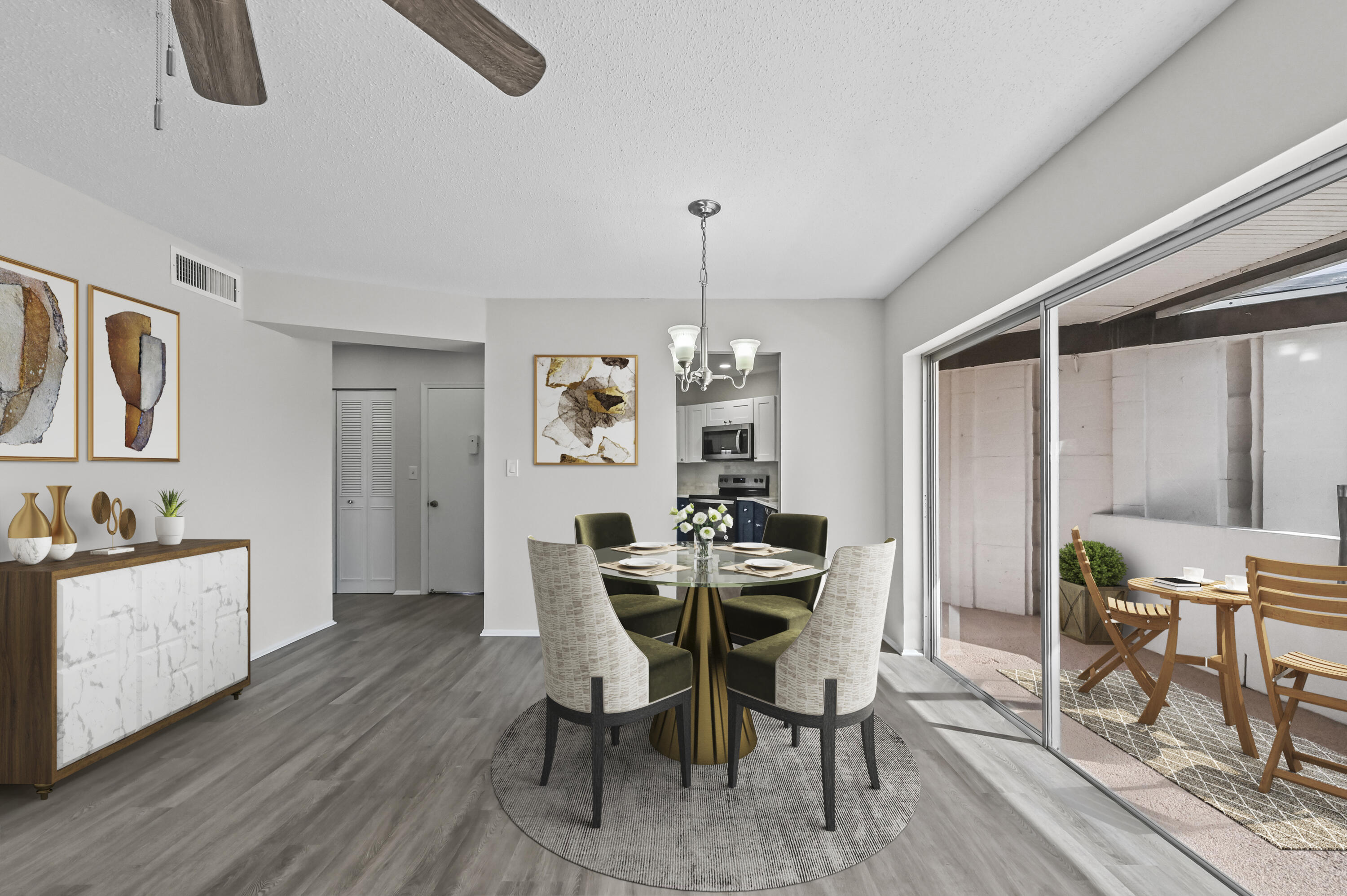6 Greenway N Royal Palm Beach North, Unit 212 Royal Palm Beach, FL 33411 - Photo 5 of 23 a view of a dining room with furniture and chandelier