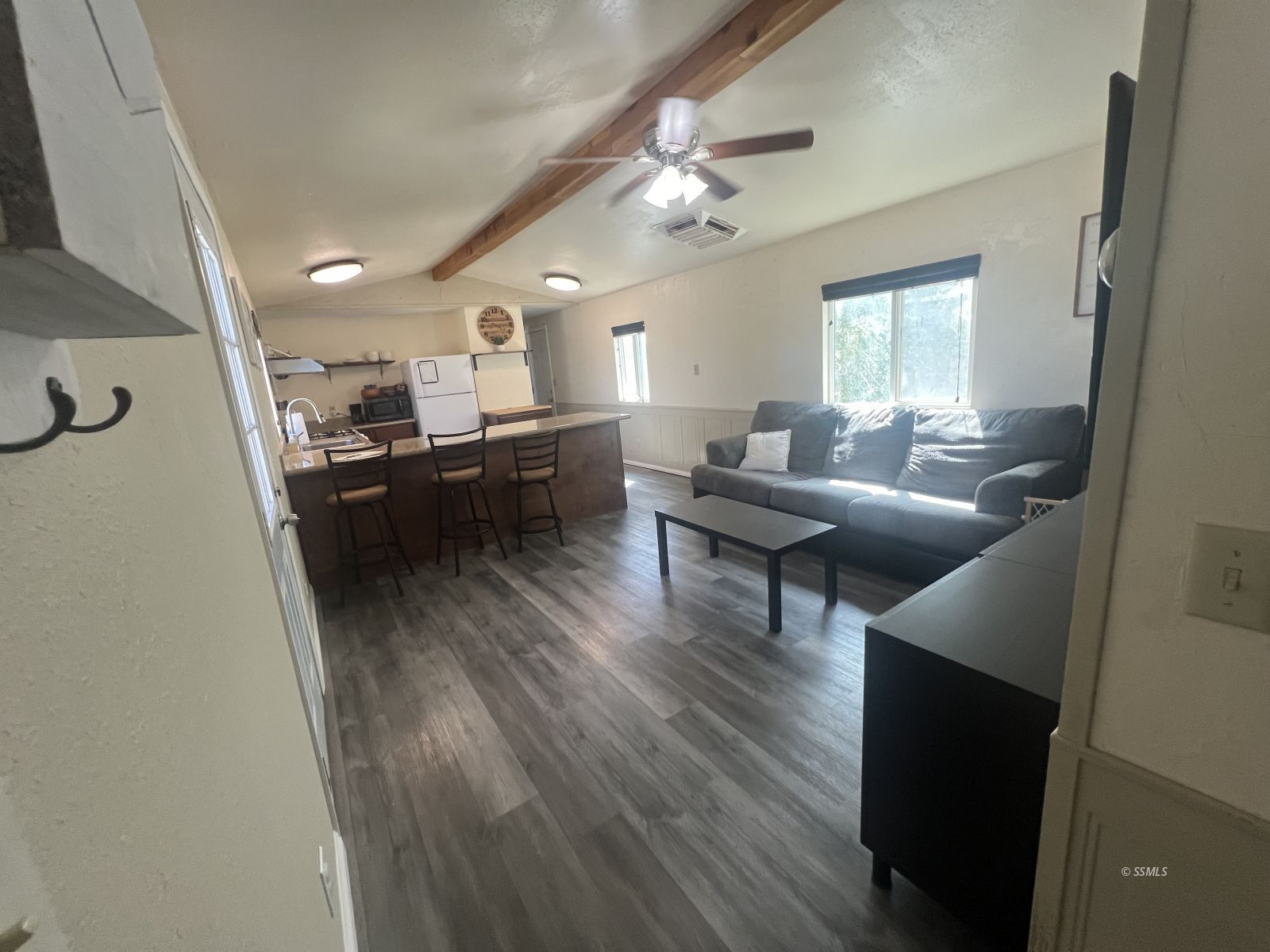 1341 North Calvert Boulevard Ridgecrest, CA 93555 - Photo 3 of 21 a living room with furniture and a wooden floor