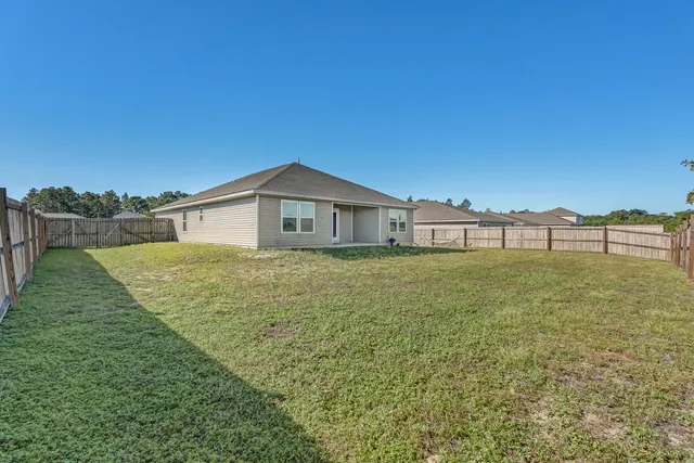 a view of a lake with a big yard