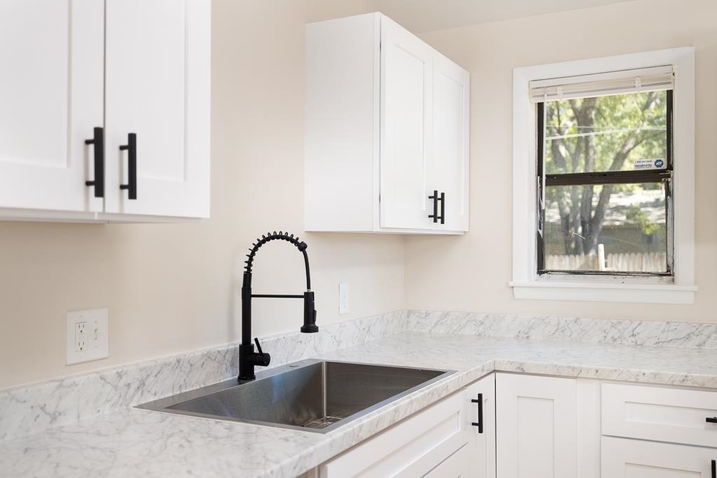 4512 Applegate Road Memphis, TN 38109 - Photo 14 of 31 a close view of sink and tap