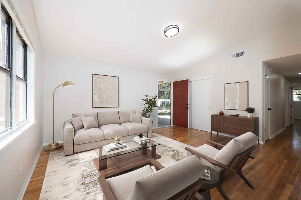 4512 Applegate Road Memphis, TN 38109 - Photo 7 of 31 a living room with furniture and a large window