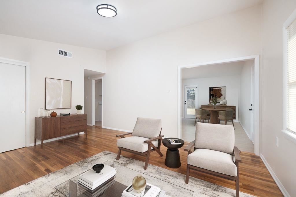 4512 Applegate Road Memphis, TN 38109 - Photo 9 of 31 a living room with furniture and wooden floor