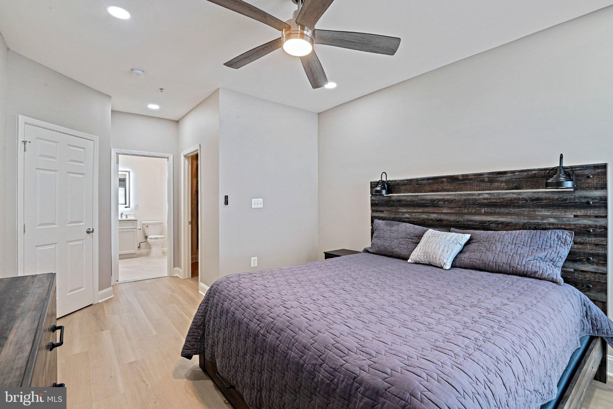 1519 North Point Drive, Unit 202 Reston, VA 20194 - Photo 32 of 49 Modern bedroom with stylish accents.