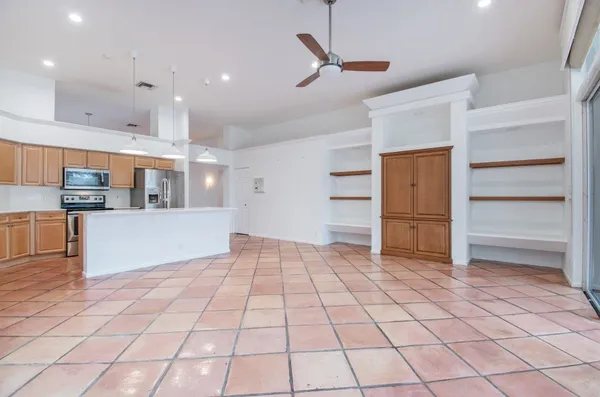 a view of kitchen with furniture and cabinets