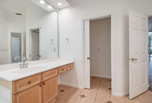 a bathroom with a sink a toilet and tub