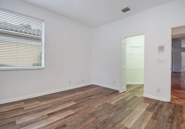 a bathroom with a sink a mirror a toilet and bathtub