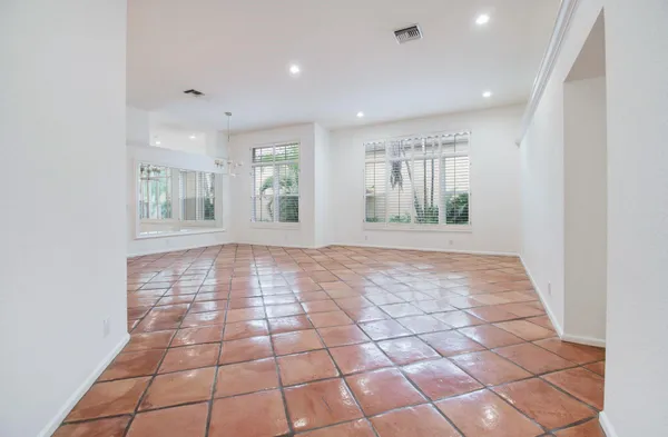 a view of an empty room and window