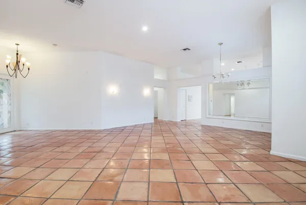 a view of an empty room and window