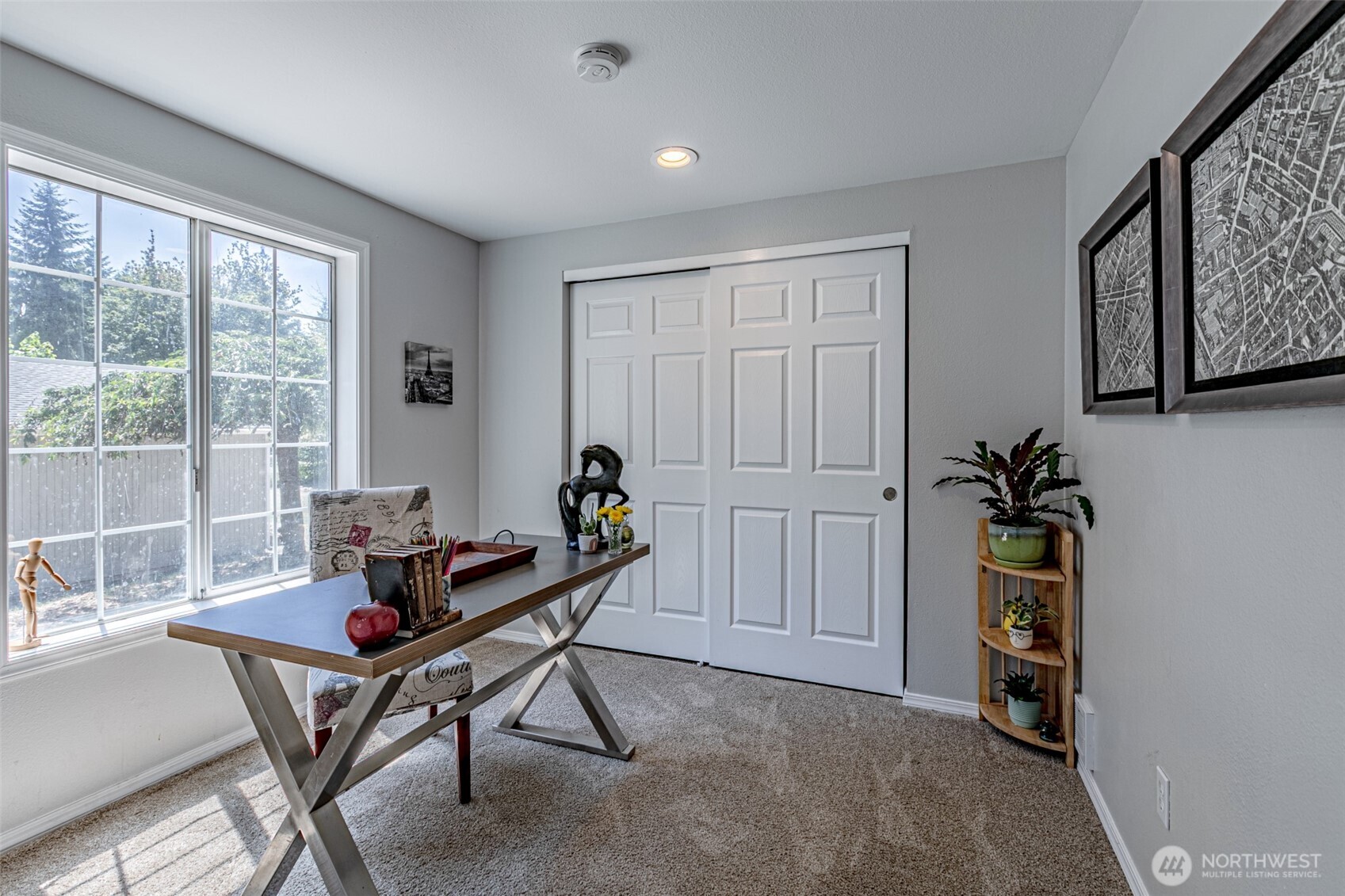 18920 217th Avenue East Orting, WA 98360 - Photo 24 of 36 a living room with furniture and a window