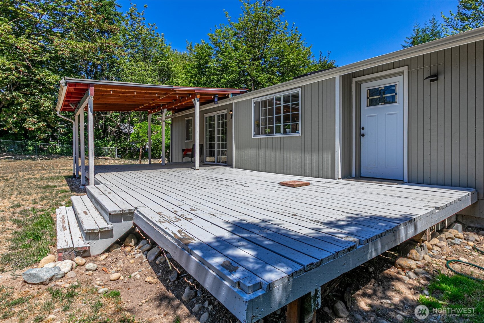 18920 217th Avenue East Orting, WA 98360 - Photo 30 of 36 a view of a wooden deck
