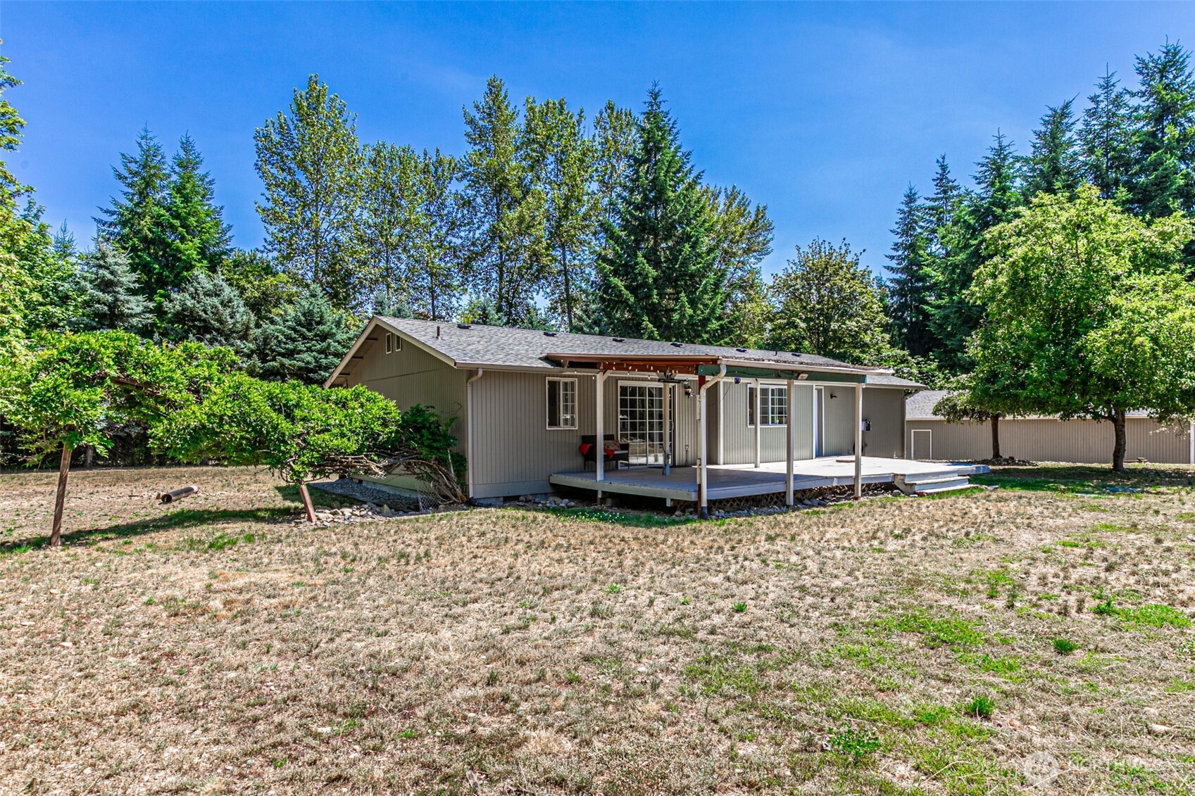 18920 217th Avenue East Orting, WA 98360 - Photo 31 of 36 a view of a house with a yard