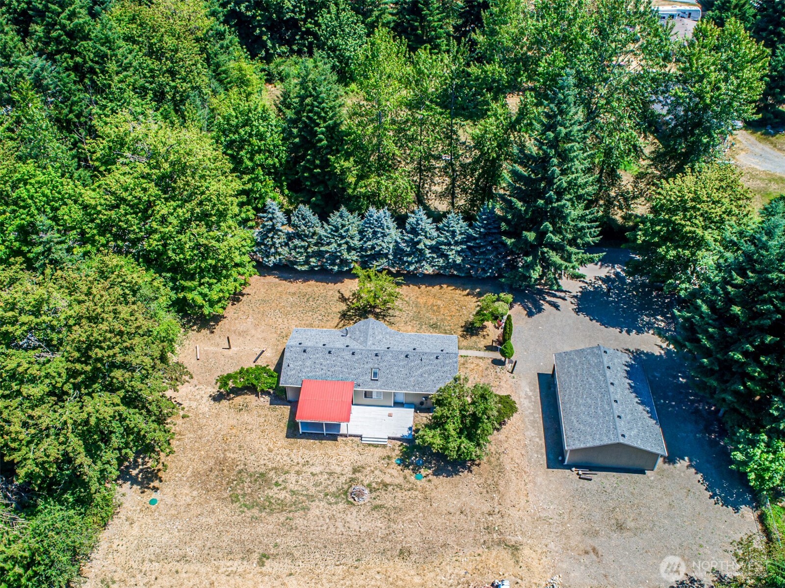 18920 217th Avenue East Orting, WA 98360 - Photo 35 of 36 an aerial view of a house with a yard