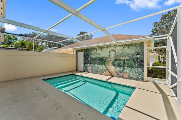 a house view with a backyard space
