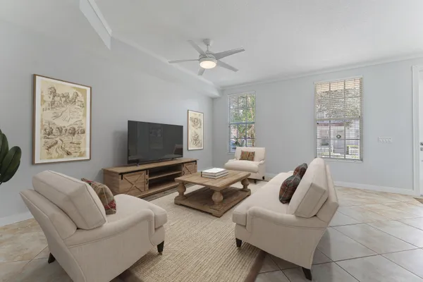 a living room with furniture and a flat screen tv