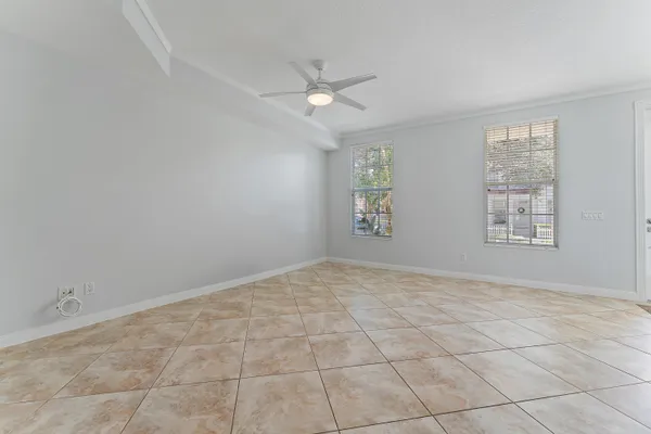 a view of an empty room with a window
