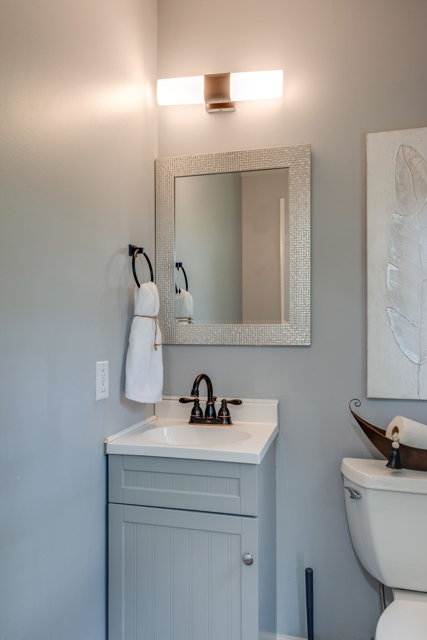 6201 Ladd Road Franklin, TN 37067 - Photo 14 of 28 a bathroom with a toilet a sink and mirror