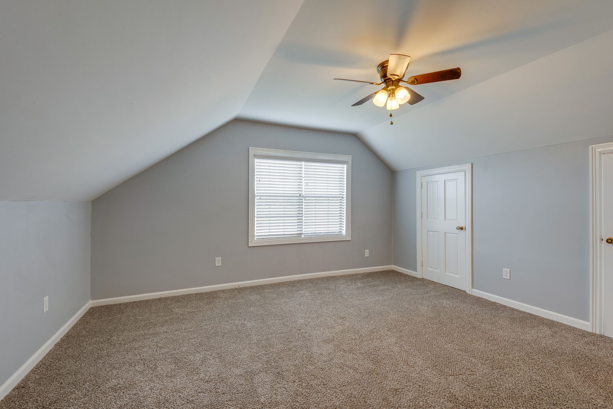 6201 Ladd Road Franklin, TN 37067 - Photo 15 of 28 a view of a livingroom with a ceiling fan and window