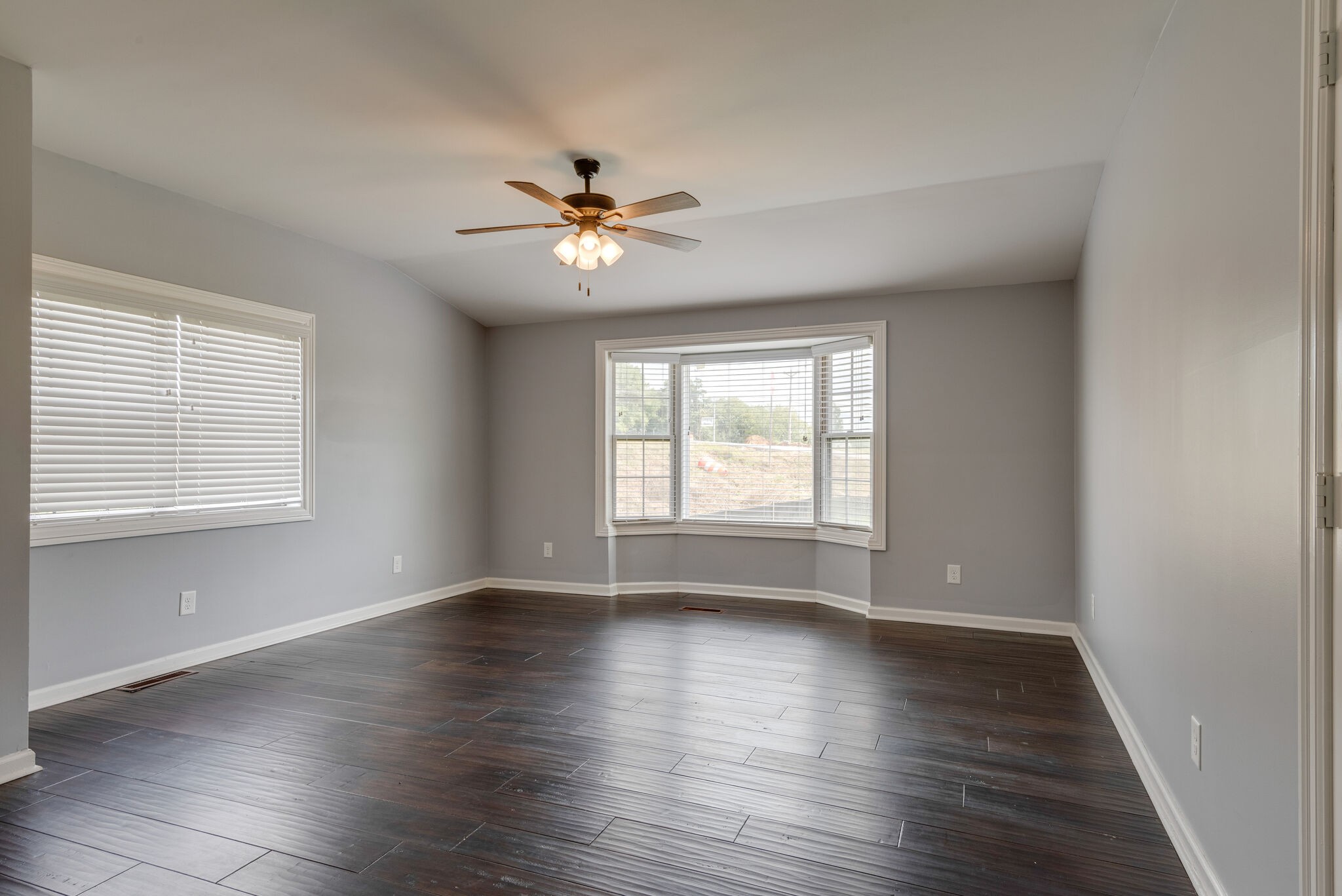6201 Ladd Road Franklin, TN 37067 - Photo 3 of 28 wooden floor in an empty room with a window