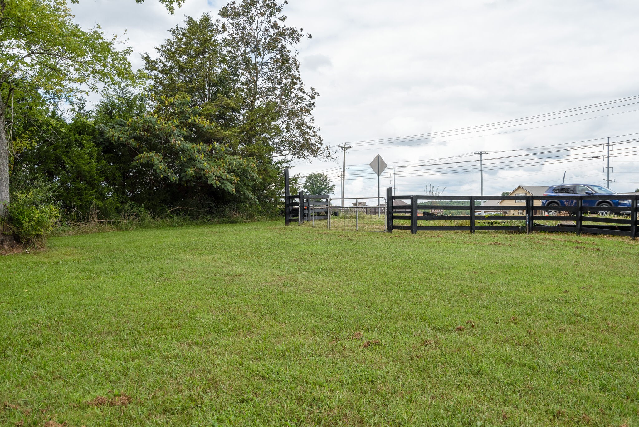 6201 Ladd Road Franklin, TN 37067 - Photo 25 of 28 a view of a bench in the middle of a field