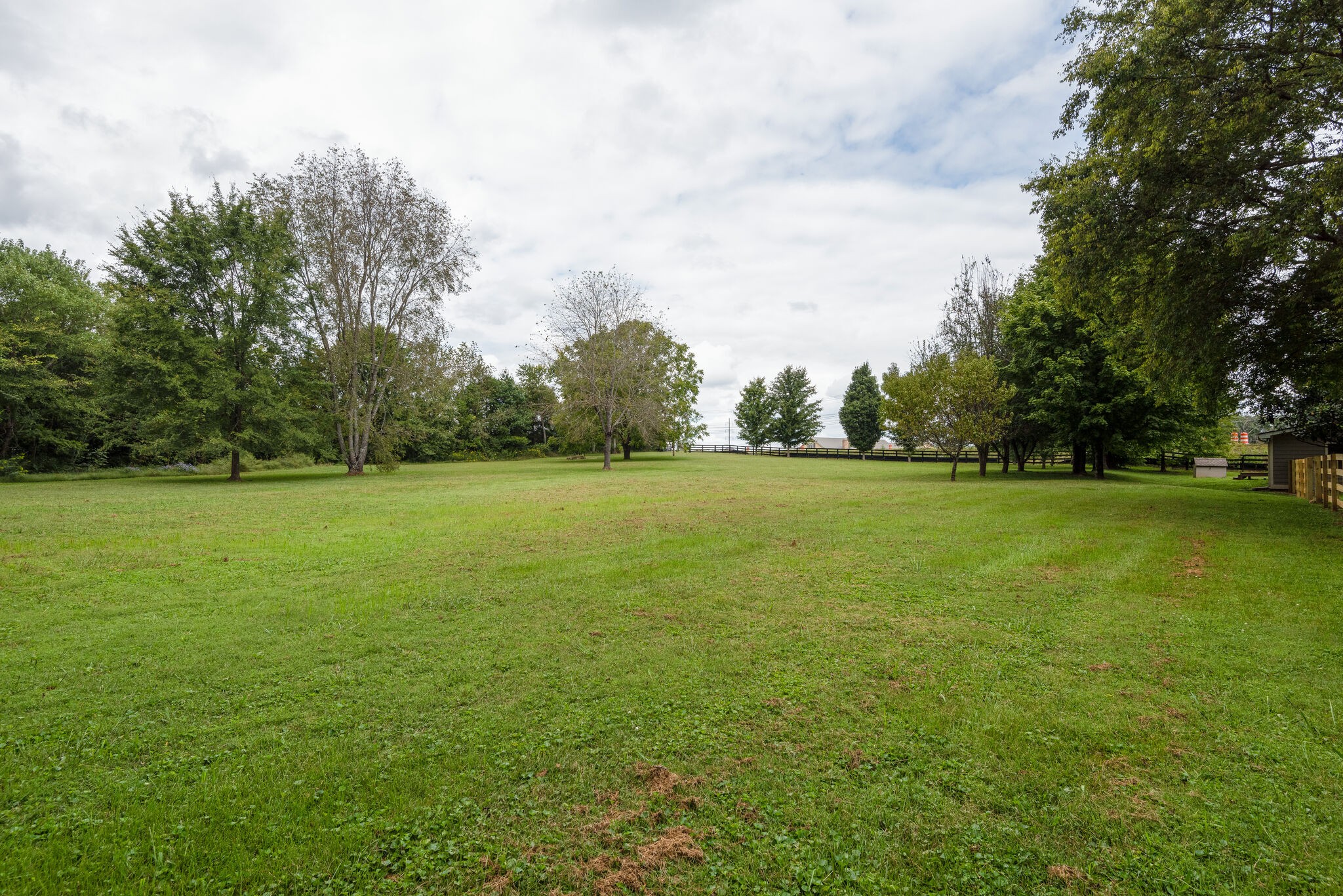 6201 Ladd Road Franklin, TN 37067 - Photo 27 of 28 a view of a green field with wooden fence
