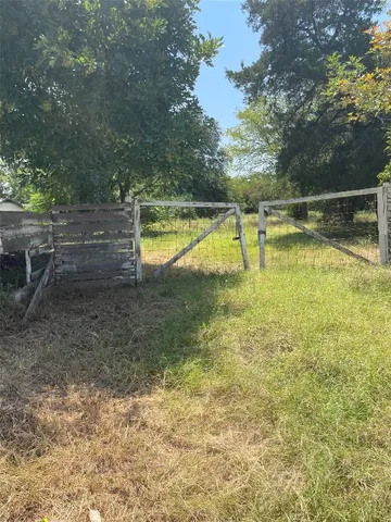 a view of a swimming pool with an outdoor space