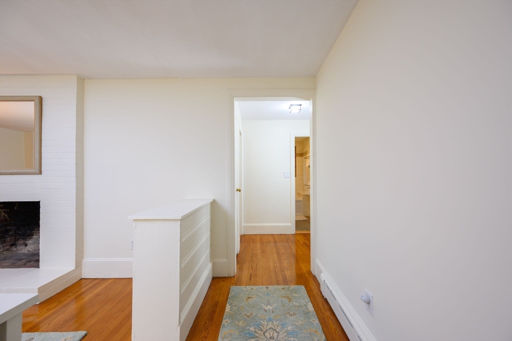 13 Smith Road Hingham, MA 02043 - Photo 11 of 32 a view of hallway with wooden floor