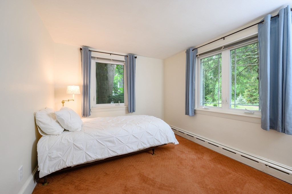 13 Smith Road Hingham, MA 02043 - Photo 18 of 32 a bedroom with a bed and window