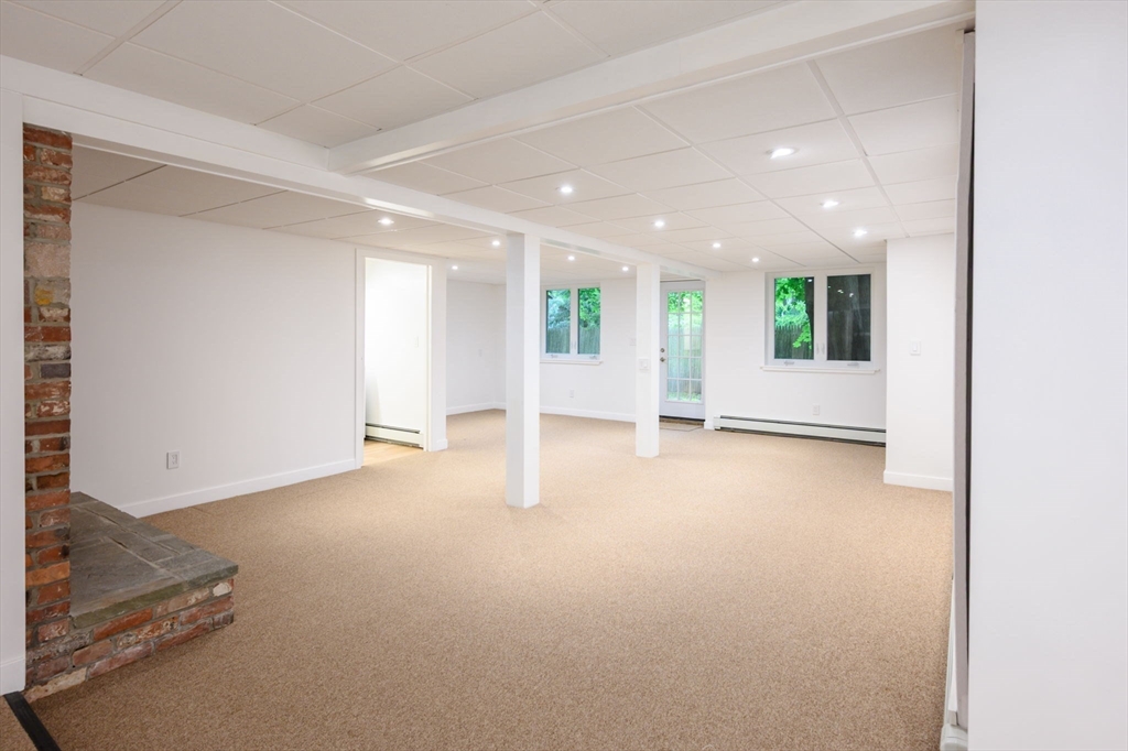 13 Smith Road Hingham, MA 02043 - Photo 19 of 32 a view of a livingroom with a staircase